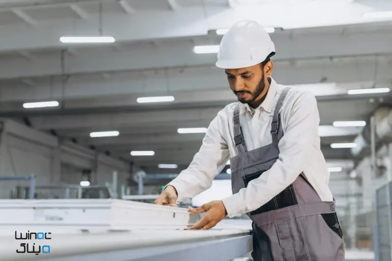 An Omani worker installs UPVC fittings.
